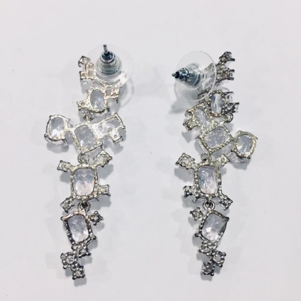 ANNE KLEIN Long Dangling Crystal Link Silver Tone